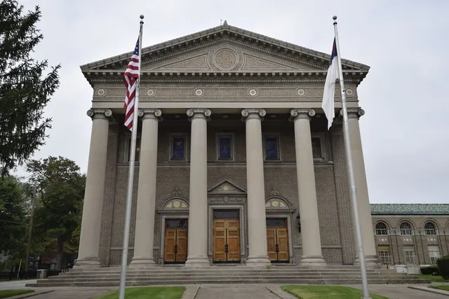 Columned stone building at 2315 Collingwood Boulevard in Toledo's Old West End